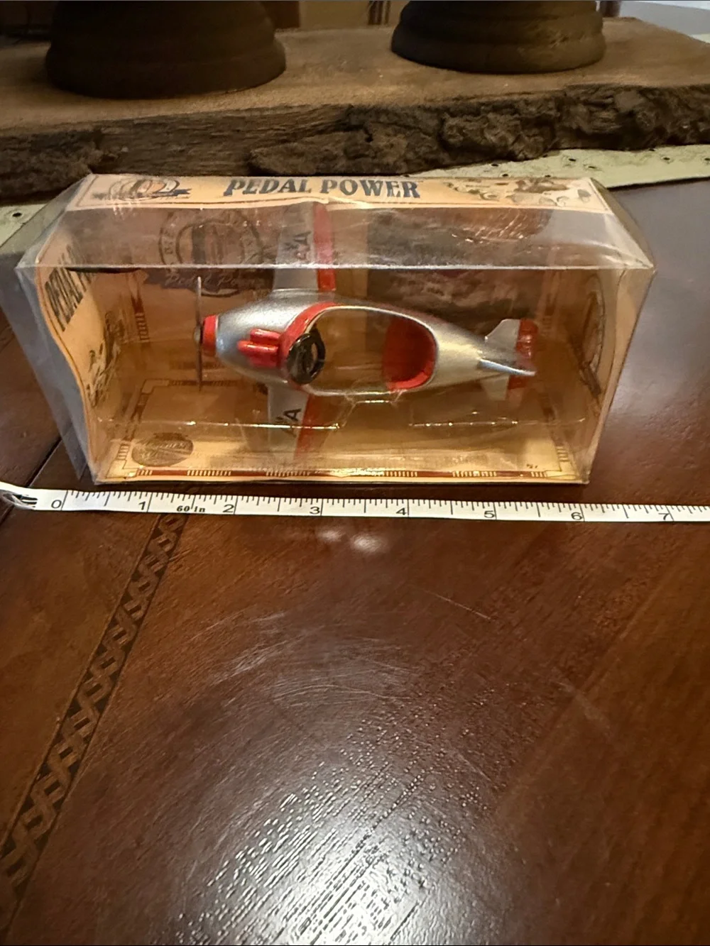 Silver and Red Pedal Power Toy Plane